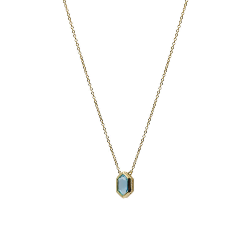 COLLAR CON PIEDRA HEXAGONAL BAÑO DORADO TONO AGUAMARINA
