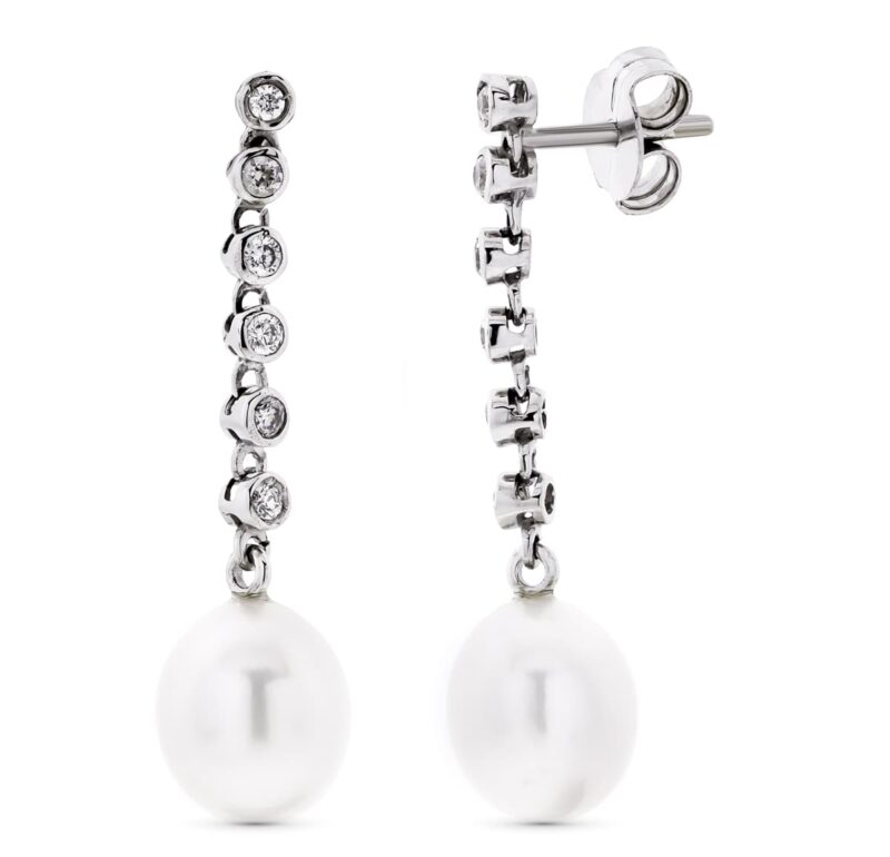 Pendientes de oro blanco largos con circonita y perla